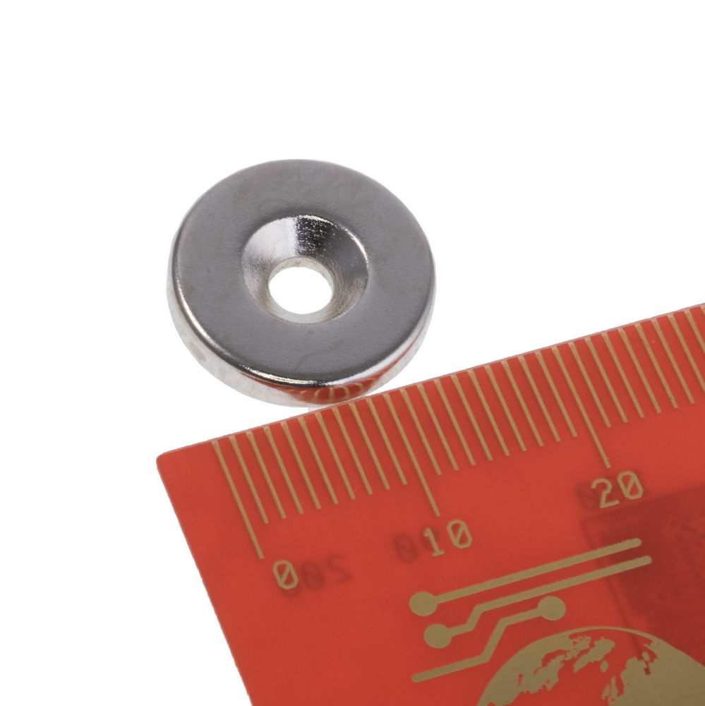 Starker Neodym Magnet mit Bohrung Ø3,5mm und konischer Senkung. Für M3 Senkkopfschrauben geeignet mit Nordpol auf der Seite mit Senkung